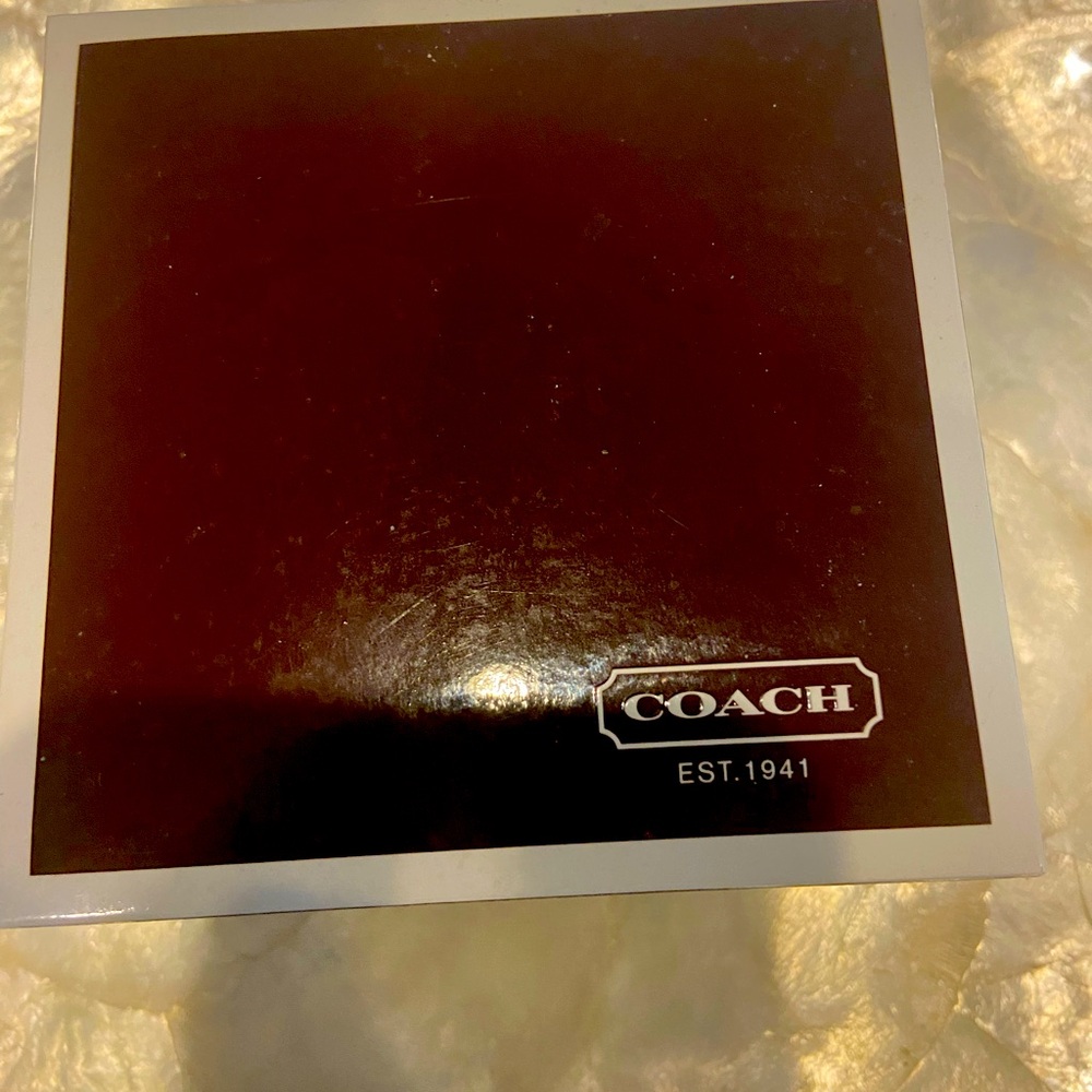 Coach watch with interchangeable face frames
